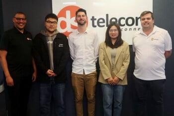 DSL Telecom employees posing for a group photo with Yeastar representatives at the DSL Telecom office in South Africa.